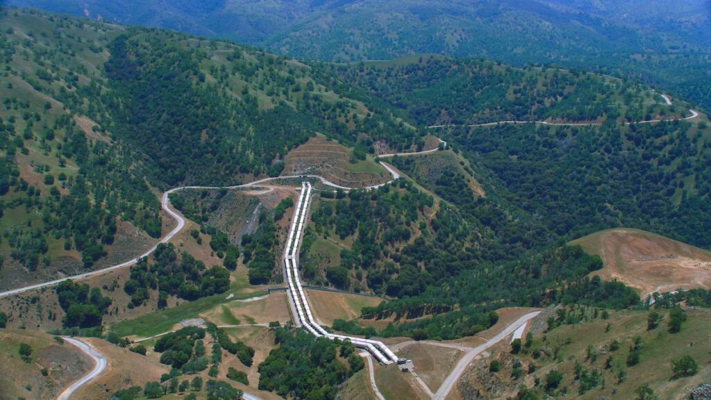 Photo of water infrastructure in California terrain, image courtesy of CA DWR